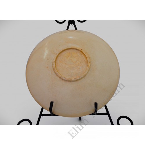 1378 A Dingyao-Ware white glaze carved flower plate